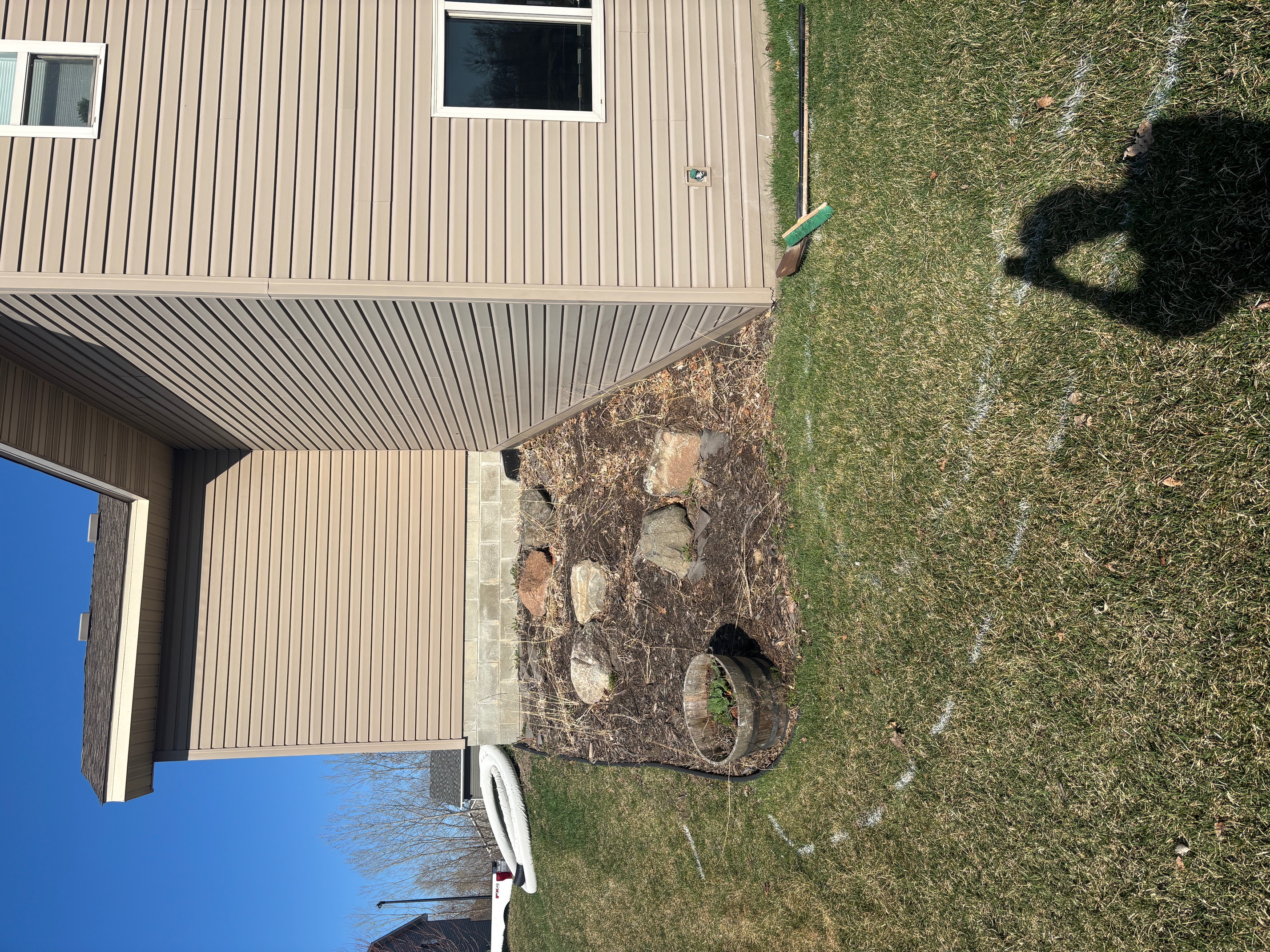 Before - retaining wall and bed area
